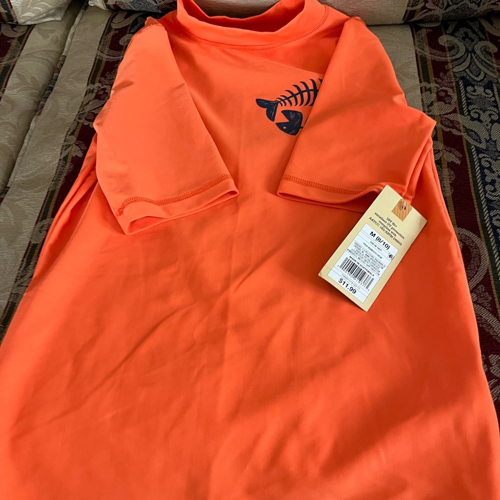 Cherokee UPF+50 orange shirt for boys.
